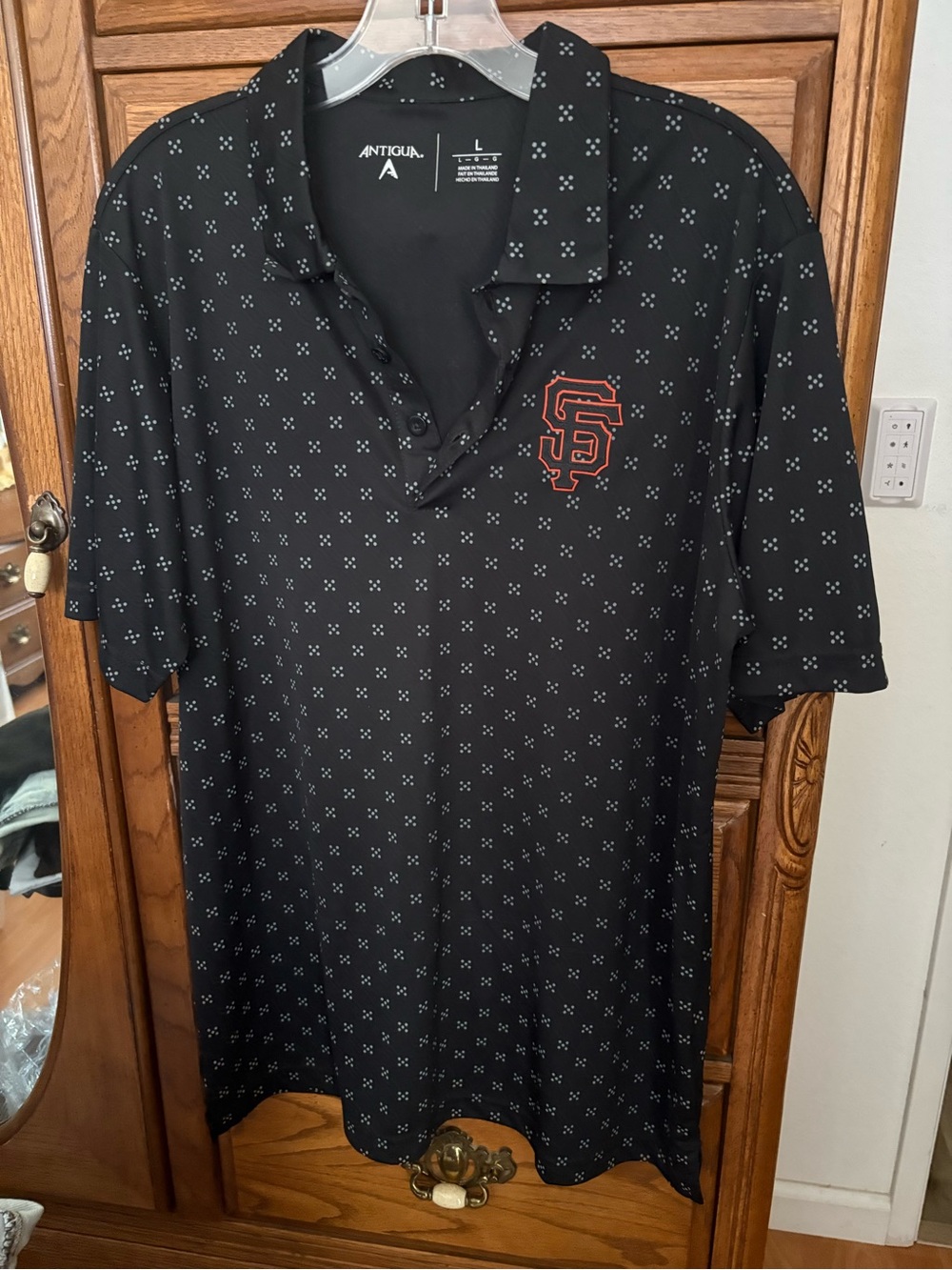 Antigua Black Polo with Orange SF Logo and Micro Pattern